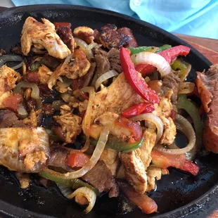 Parralliadas - Chicken, fresh grilled steak, sausages, peps onions and lots of goodness!