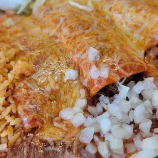 3 enchilada red sauce platter. Cheese, ground beef or shredded chicken.  Got one of each