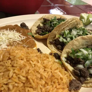 3 Tacos de Carne Asada with rice and beans