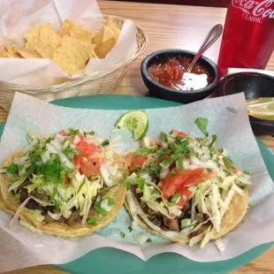 Carne Asada with corn tortillas and chips with salsa. The salsa is a little spicy, but delicious and the chips are served warm!