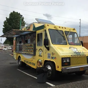 a yellow food truck