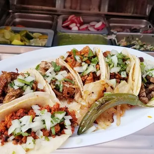 Carnitas, adobada, asada and chorizo, with an open salsa bar built into the truck, whaaaa