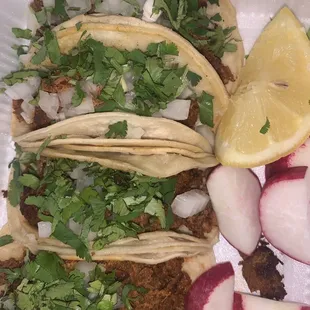 Tacos al pastor, really good flavor! Generous with the meat.