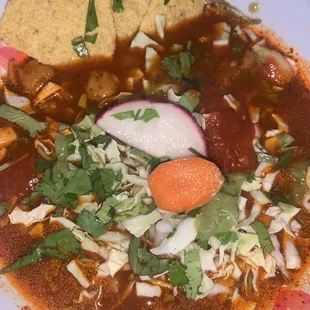 Posole I served from my to go order. Really good flavor. They give you Lots of goodies to add in.
