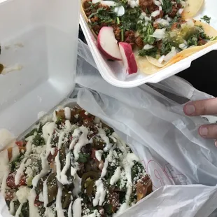 The enormous, delicious nachos and mouth watering Al Pastor tacos!!!
