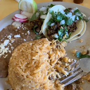 Too bad I didn&apos;t take a pic before I ate ! They give a generous amount of rice and their tacos are filled up!
