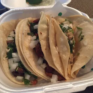 Tres tacos - asada, pastor, pollo