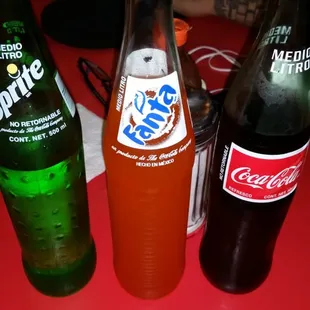 a bottle of soda and a bottle of soda