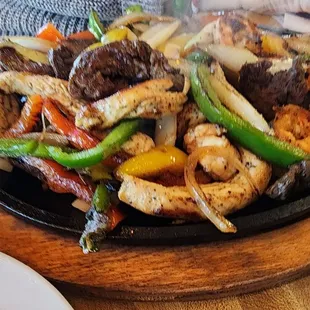 Jessy's Fajitas: shrimp, chicken &amp; beef fajitas mixed with bell peppers &amp; onions