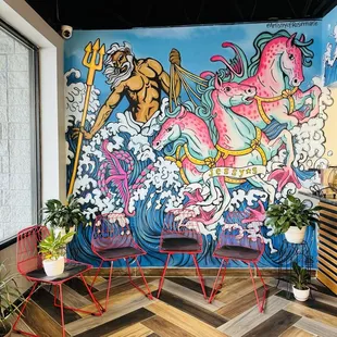 a mural of a woman riding a horse