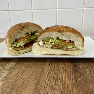 a sandwich cut in half on a plate