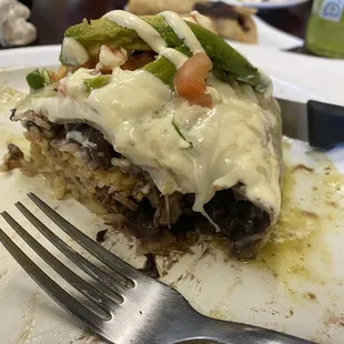 The burrito drowned in salsa. Delicious.