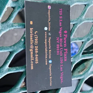 a business card on a bench