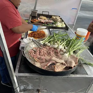 a man preparing food