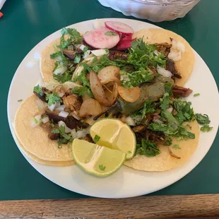 A Glorious plate of five carnitas soft tacos.