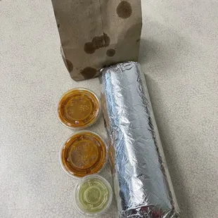 Super burrito with complimentary salsas and tortilla chips at Taqueria La Bamba in Richmond.