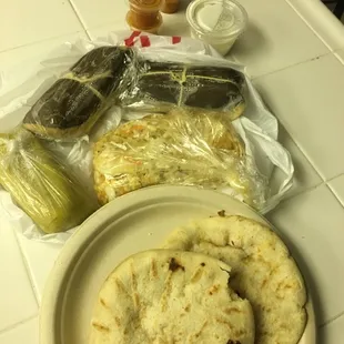 pork &amp; cheese pupusa, cheese &amp; locoro pupusa, veggies, and 3 Salvadorian tamales (corn, chicken and pork).