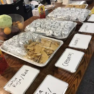 a variety of taqueria items on a table