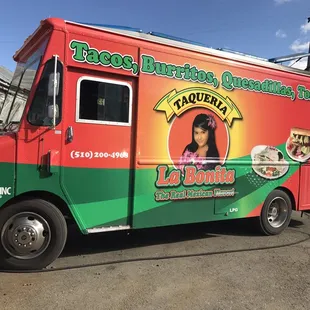 a taqueria truck parked in a parking lot