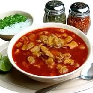a bowl of soup and a spoon