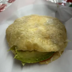 Gordita.....bigger than it looks and delicious. Put some salsa in it!