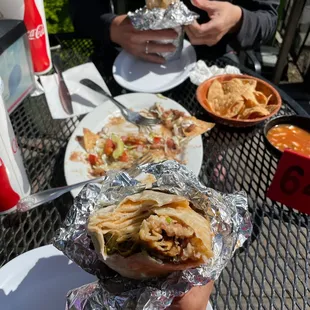 Chile rellenos burrito & already eaten nachos
