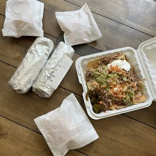 2 super burritos and super nachos - complimentary chips!