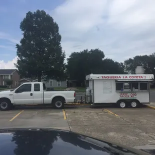 a taqueria truck parked in a parking lot