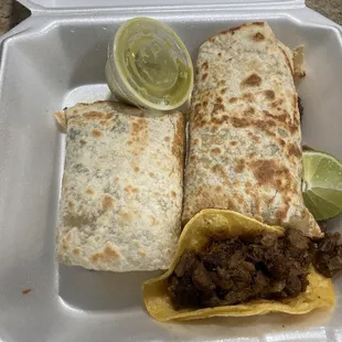 Lengua burrito and steak taco with verde salsa.