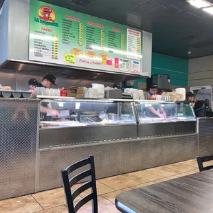 Watching them make the food fresh to order