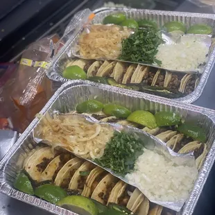 three trays of tacos