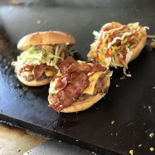 Crazy Burger Cheese, bacon, grilled onions, lettuce, tomato ketchup mayonnaise mustard.