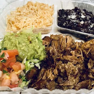 Carnitas Uruapan. Loaded with pork, guac, beans!