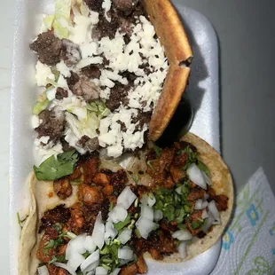 a taco with meat and onions