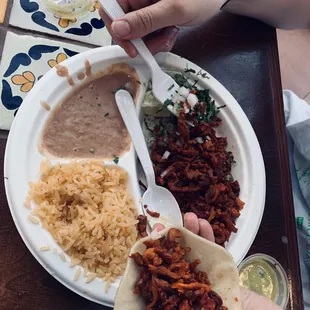 7/10.  Meat was good with nice serving size.  Beans and rice on the bland side.