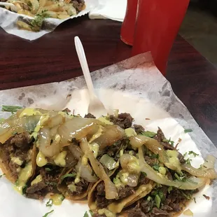 a taqueria la herrada with onions and onions