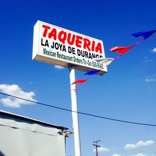 a taqueria sign