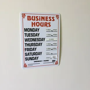 a business hours sign