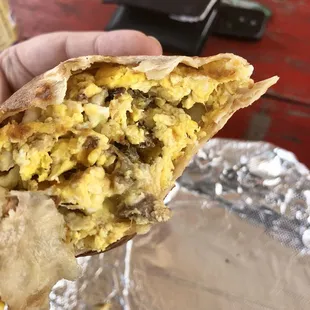 Breakfast Burrito is large n tastes great!  I added bacon potatoes n onions n only 6 bucks!