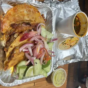 Better view!! Una salsita, Quesobirria tacos &amp; their broth