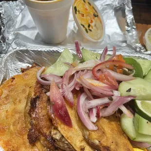 Quesobirria tacos and their consomé.