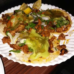 Al Pastor tacos that&apos;ll get you addicted. The tortillas are lightly toasted and they come with an avocado sauce.