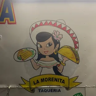 a woman holding a taqueria