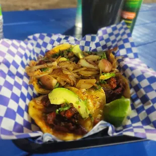 Trompo Street Tacos with avocado and grilled onions