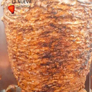 a close up of a meat skewer