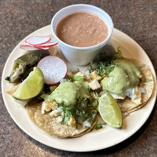 Two Pollo Tacos and a Side of Beans After a Trip to the Toppings Bar