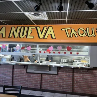 Signage and kitchen.