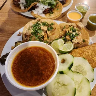 Various tacos and toppings