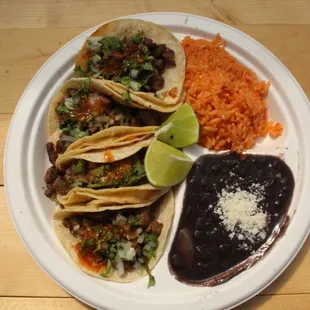 Taco Plate - 4 handmade corn tortillas, rice, beans, salsa, lime.