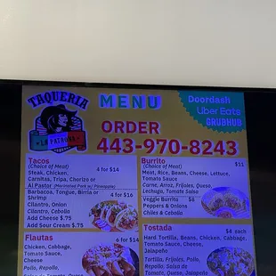 a menu displayed on a flat screen tv